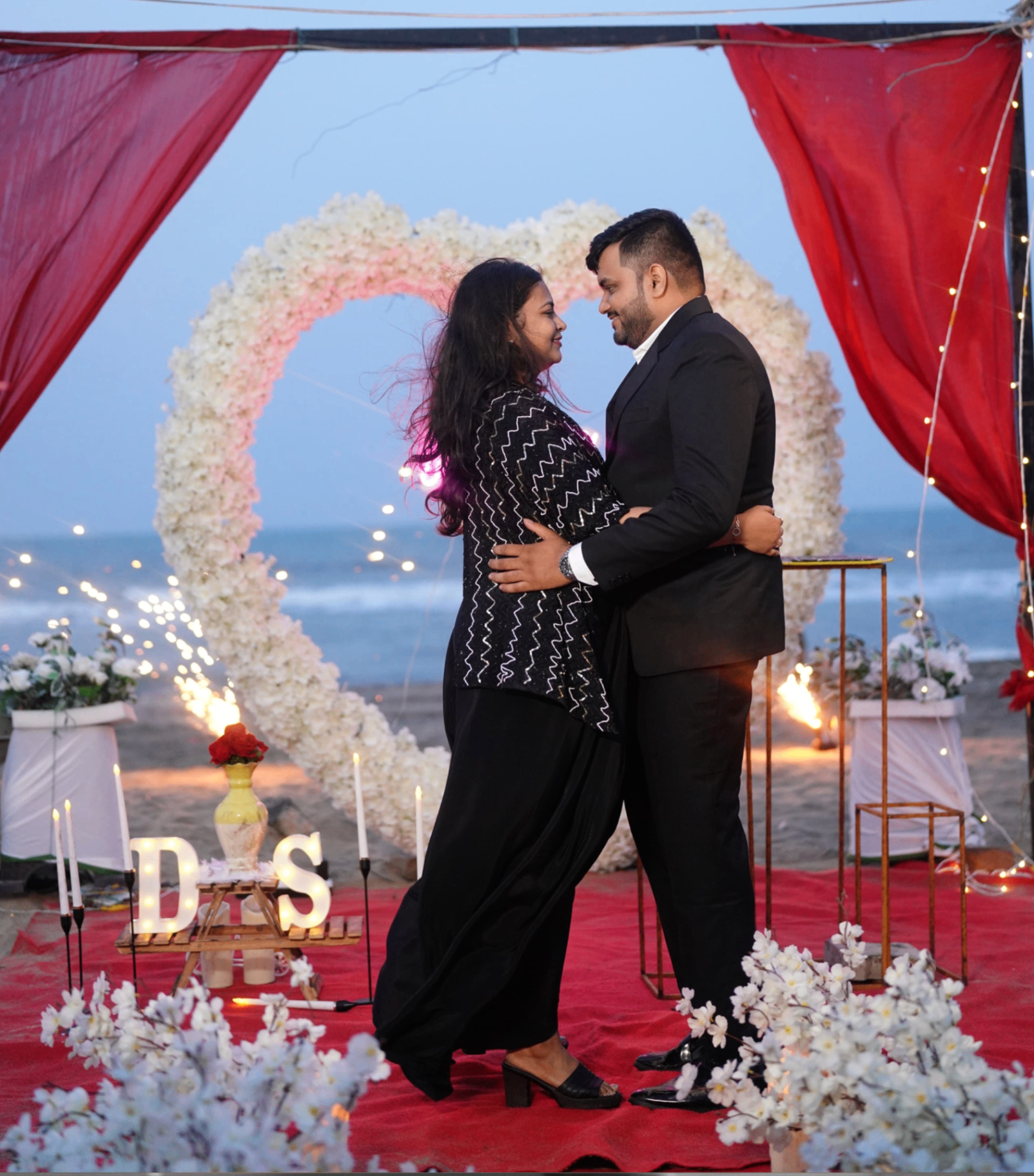 Saloni and Dharshan together at a beachside setup
