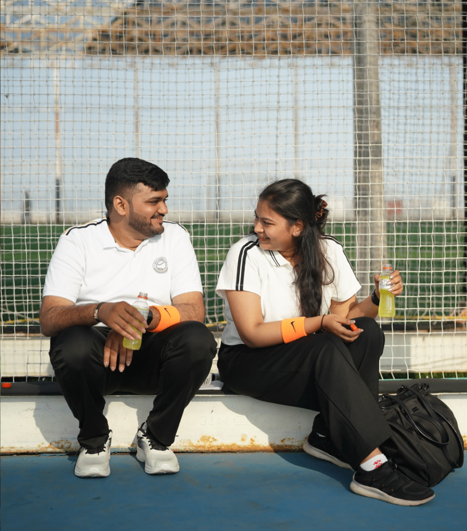Saloni and Dharshan seated together after sport practice